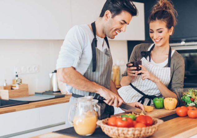 Couple cooking together, 