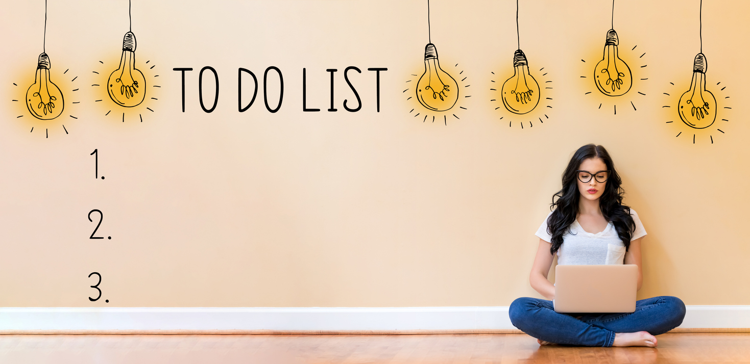 To do list with woman using a laptop
